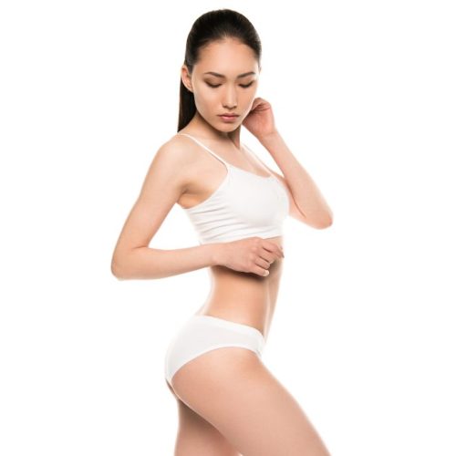 slim attractive asian woman posing in white underwear, isolated on white